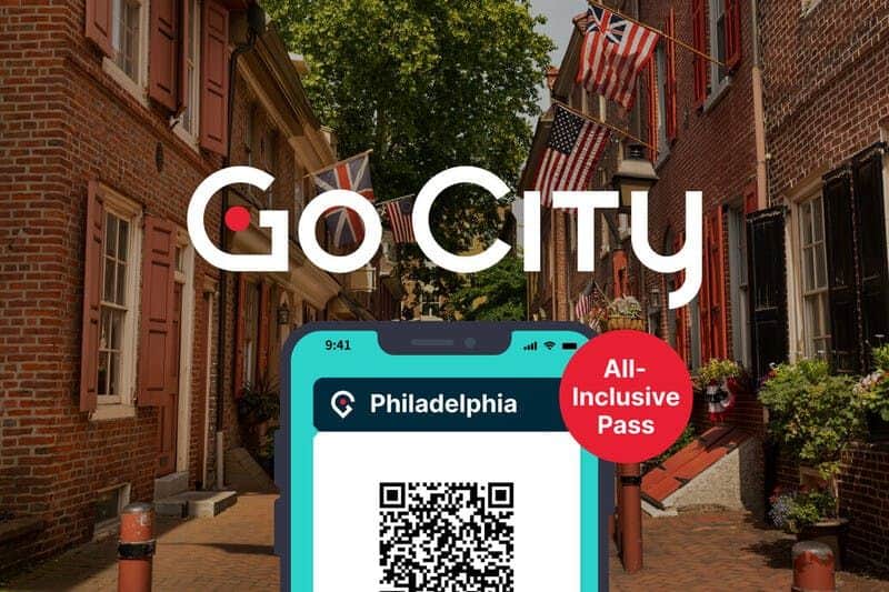"Go City" ad featuring a Philadelphia All-Inclusive Pass QR code on a smartphone. Background shows a historic street with flags.